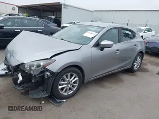 2014 Mazda 3 i Touring with VIN JM1BM1L76E1204265, listed as a IAAI auction lot 42565471 with 68,675 mi miles and . Bid and sale history available at DreamBid. Image 17.