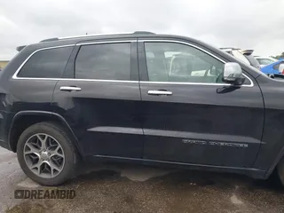 2021 Jeep Grand Cherokee Overland z VIN 1C4RJFCG4MC621214, wystawiony jako IAAI lot #42188010 z przebiegiem 15 559 mil mil oraz . Historia ofert i sprzedaży dostępna na DreamBid. Obrazek 14.