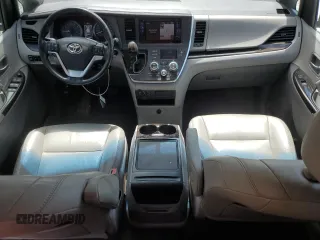 2015 Toyota Sienna XLE with VIN 5TDYK3DCXFS668851, listed as a Copart auction lot 60452005 with 205,549 mi miles and Salvage title. Bid and sale history available at DreamBid. Image 8.