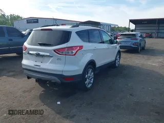 2013 Ford Escape SEL with VIN 1FMCU9H99DUA97959, listed as a IAAI auction lot 41879967 with 149,456 mi miles. Bid and sale history available at carsss.com. Image 4.