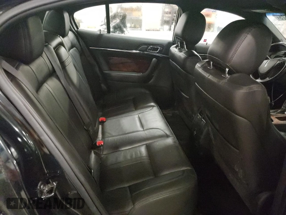 2014 Lincoln MKS with VIN 1LNHL9DK3EG611354, listed as a Copart auction lot 49008525 with 114,232 mi miles and Salvage Title. Bid and sale history available at carsss.com. Image 10.
