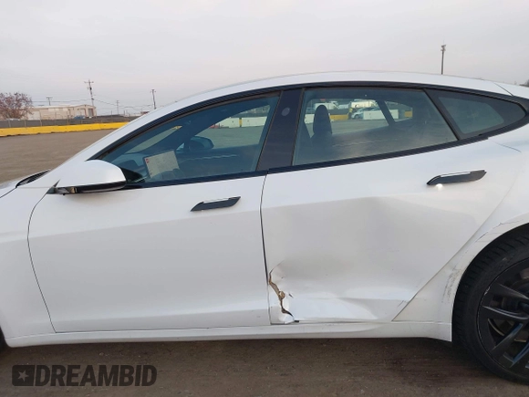 2022 Tesla Model S with VIN 5YJSA1E57NF483768, listed as a IAAI auction lot 41069339 with 35,342 mi miles and . Bid and sale history available at DreamBid. Image 14.