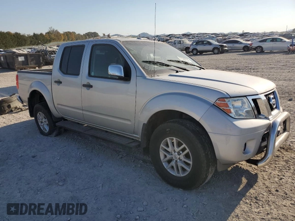 2015 Nissan Frontier S with VIN 1N6AD0EV3FN705610, listed as a Copart auction lot 77530764 with 165,782 mi miles and Salvage title. Bid and sale history available at DreamBid. Image 4.