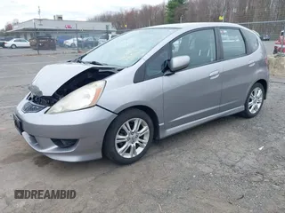 2009 Honda Fit Sport with VIN JHMGE88429S059170, listed as a IAAI auction lot 42091260 with 135,822 mi miles. Bid and sale history available at carsss.com. Image 2.