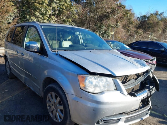 2011 Chrysler Town & Country Touring L with VIN 2A4RR8DGXBR714238, listed as a IAAI auction lot 41283027 with 205,498 mi miles and . Bid and sale history available at DreamBid. Image 1.