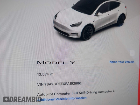 2023 Tesla Model Y Long Range with VIN 7SAYGDEEXPA152986, listed as a IAAI auction lot 41946665 with 13,574 mi miles and . Bid and sale history available at carsss.com. Image 15.