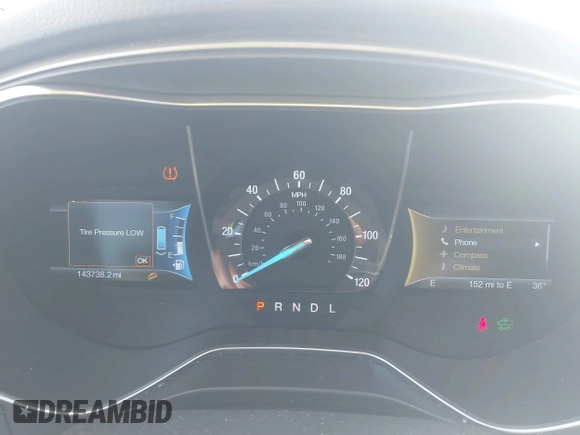 2015 Ford Fusion SE Hybrid with VIN 3FA6P0LUXFR133979, listed as a IAAI auction lot 41831288 with 143,738 mi miles. Bid and sale history available at carsss.com. Image 7.