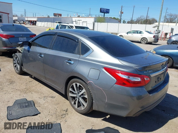 2016 Nissan Altima SR with VIN 1N4AL3AP1GC285363, listed as a IAAI auction lot 41754598 with 121,923 mi miles and . Bid and sale history available at carsss.com. Image 3.
