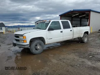 1999 Chevrolet Silverado 3500 z VIN 1GCHC33J2XF087634, wystawiony jako Copart lot #58106714 z przebiegiem 205 431 mil mil oraz Czysty tytuł • Clean title. Historia ofert i sprzedaży dostępna na DreamBid. Obrazek 1.