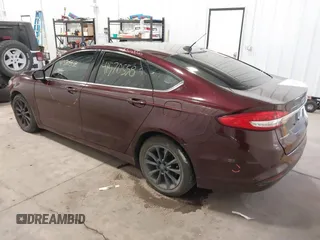 2017 Ford Fusion SE with VIN 3FA6P0H72HR282909, listed as a IAAI auction lot 41570558 with 122,444 mi miles. Bid and sale history available at carsss.com. Image 3.