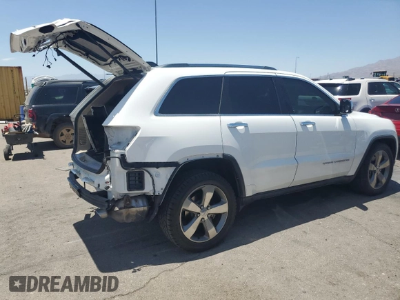 2014 Jeep Grand Cherokee Limited with VIN 1C4RJFBT2EC471846, listed as a Copart auction lot 63637415 with 130,262 mi miles and Salvage title. Bid and sale history available at DreamBid. Image 3.
