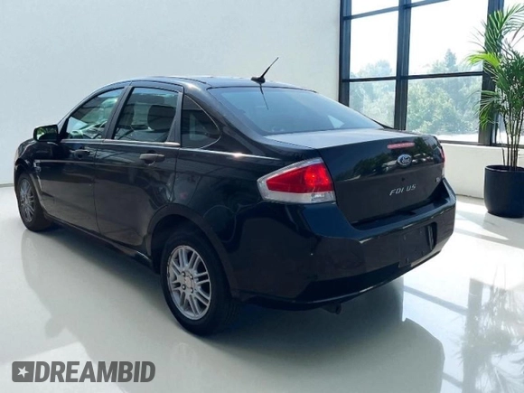 2008 Ford Focus SE with VIN 1FAHP35N28W24058, listed as a Copart auction lot 66020775 with 164,683 mi miles and Clean title. Bid and sale history available at DreamBid. Image 4.