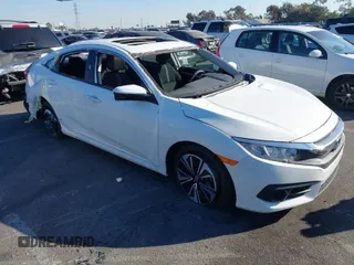 2017 Honda Civic Sedan EX-T with VIN 19XFC1E38HE002205, listed as a IAAI auction lot 40891678 with 10,398 mi miles. Bid and sale history available at carsss.com. Image 1.