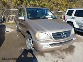2003 Mercedes-Benz M-Class 3.7L with VIN 4JGAB57E33A414218, listed as a IAAI auction lot 41057534 with 132,342 mi miles. Bid and sale history available at carsss.com. Image 1.