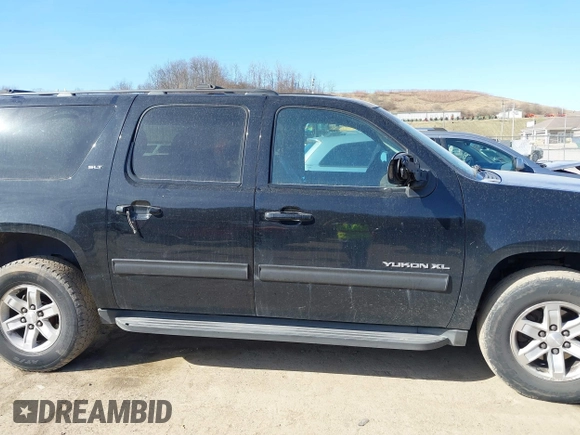 2014 GMC Yukon XL SLT with VIN 1GKS2KE79ER238831, listed as a IAAI auction lot 41767472 with 284,596 mi miles. Bid and sale history available at carsss.com. Image 13.