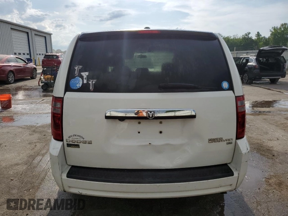 2009 Dodge Grand Caravan SE z VIN 2D8HN44E29R631418, wystawiony jako Copart lot #54954675 z przebiegiem 271 986 mil mil oraz Szkoda całkowita • Salvage title. Historia ofert i sprzedaży dostępna na DreamBid. Obrazek 6.