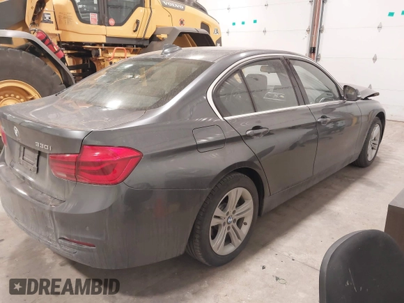 2018 BMW 3 Series 330i xDrive with VIN WBA8D9G59JNU68145, listed as a IAAI auction lot 41079634 with 48,872 mi miles and . Bid and sale history available at carsss.com. Image 4.