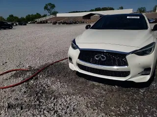 2018 Infiniti QX30 Luxury with VIN SJKCH5CP2JA044425, listed as a Copart auction lot 53065965 with 111,224 mi miles and Salvage title. Bid and sale history available at DreamBid. Image 14.