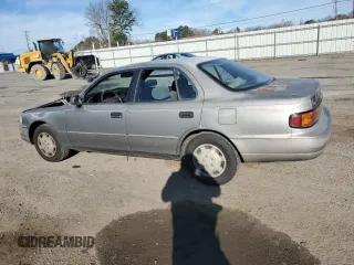1992 Toyota Camry LE with VIN 4T1SK12E3NU104088, listed as a Copart auction lot 47496735 with 174,957 mi miles and Salvage Title. Bid and sale history available at carsss.com. Image 2.