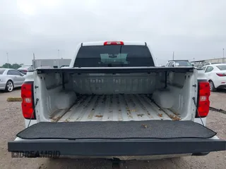 2018 Chevrolet Silverado 1500 LT with VIN 3GCPCREC7JG402401, listed as a IAAI auction lot 41880462 with 128,995 mi miles and . Bid and sale history available at DreamBid. Image 17.