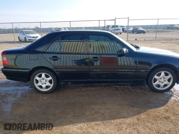 2000 Mercedes-Benz C 230 Kompressor with VIN WDBHA24G4YA838524, listed as a IAAI auction lot 41582117 with Not Provided miles and . Bid and sale history available at carsss.com. Image 13.