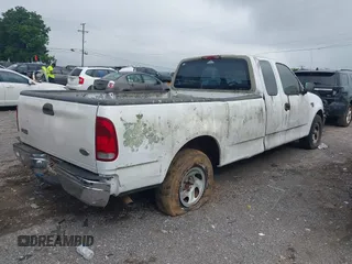 1998 Ford F-150 with VIN 1FTZX1763WKC13105, listed as a IAAI auction lot 42546968 with 181,258 mi miles and . Bid and sale history available at DreamBid. Image 4.