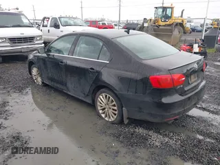 2014 Volkswagen Jetta TDI w/Premium with VIN 3VWLL7AJ1EM406360, listed as a IAAI auction lot 41857580 with 93,333 mi miles and . Bid and sale history available at DreamBid. Image 3.