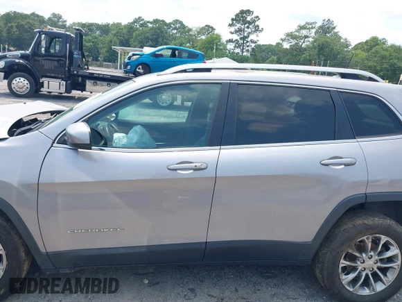 2019 Jeep Cherokee Latitude Plus with VIN 1C4PJLLB3KD184842, listed as a IAAI auction lot 42389142 with 123,324 mi miles and . Bid and sale history available at DreamBid. Image 14.