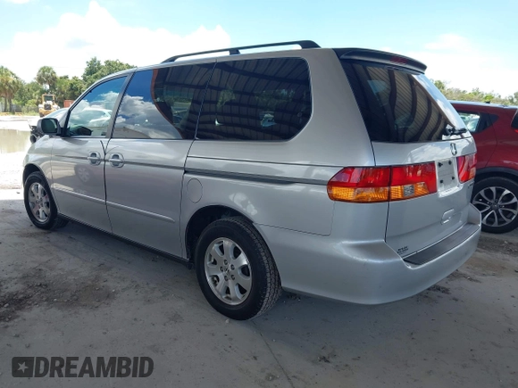 2003 Honda Odyssey EX-L z VIN 5FNRL18933B087714, wystawiony jako IAAI lot #42510813 z przebiegiem 145 360 mil mil oraz . Historia ofert i sprzedaży dostępna na DreamBid. Obrazek 3.