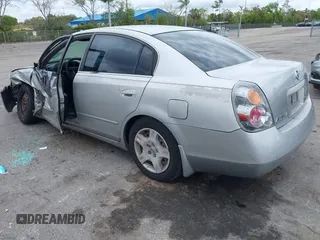 2004 Nissan Altima S with VIN 1N4AL11D04C130857, listed as a IAAI auction lot 41661519 with 147,518 mi miles. Bid and sale history available at carsss.com. Image 3.