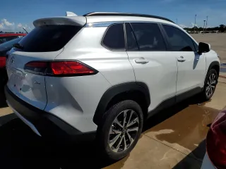 2022 Toyota Corolla Cross XLE with VIN 7MUDAAAG1NV023474, listed as a Copart auction lot 73162374 with 29,235 mi miles and Salvage title. Bid and sale history available at DreamBid. Image 3.