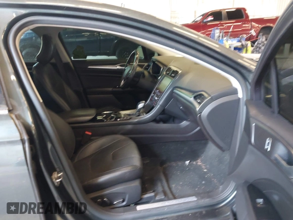 2016 Ford Fusion Titanium with VIN 3FA6P0SU4GR195865, listed as a IAAI auction lot 42203798 with 83,918 mi miles and . Bid and sale history available at DreamBid. Image 5.