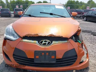 2012 Hyundai Veloster w/Gray Int с VIN KMHTC6AD0CU043402, выставлен на аукционе IAAI как лот 42406321 с пробегом 116 734 миль миль и . История ставок и продаж доступна на DreamBid. Изображение 13.