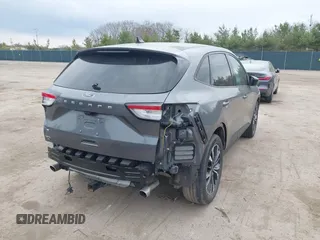 2021 Ford Escape SE z VIN 1FMCU0G62MUA94307, wystawiony jako IAAI lot #42018728 z przebiegiem 142 662 mil mil oraz . Historia ofert i sprzedaży dostępna na DreamBid. Obrazek 6.