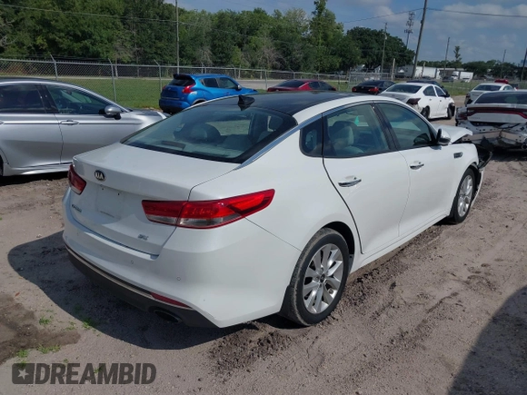 2016 Kia Optima EX z VIN 5XXGU4L31GG064220, wystawiony jako IAAI lot #39443639 z przebiegiem 98 808 mil mil oraz . Historia ofert i sprzedaży dostępna na DreamBid. Obrazek 4.