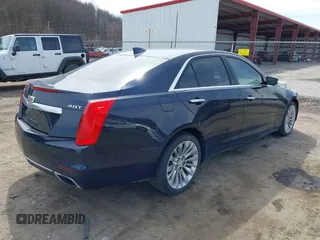 2016 Cadillac CTS Luxury Collection AWD with VIN 1G6AX5SX2G0176665, listed as a IAAI auction lot 41793579 with 67,985 mi miles and . Bid and sale history available at DreamBid. Image 4.