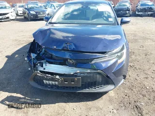 2021 Toyota Corolla LE with VIN JTDEPMAE7MJ150092, listed as a IAAI auction lot 41744119 with 82,203 mi miles and . Bid and sale history available at DreamBid. Image 6.