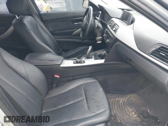 2013 BMW 3 Series 328i with VIN WBA3C1G59DNN93746, listed as a IAAI auction lot 41527720 with 215,442 mi miles and . Bid and sale history available at DreamBid. Image 5.