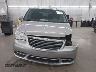 2013 Chrysler Town & Country Touring with VIN 2C4RC1BG9DR714736, listed as a IAAI auction lot 41824364 with 156,486 mi miles. Bid and sale history available at carsss.com. Image 13.