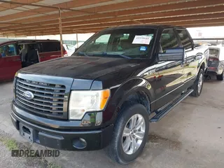 2014 Ford F-150 XL with VIN 1FTFW1CF5EFA12101, listed as a IAAI auction lot 41938641 with 120,693 mi miles. Bid and sale history available at carsss.com. Image 2.