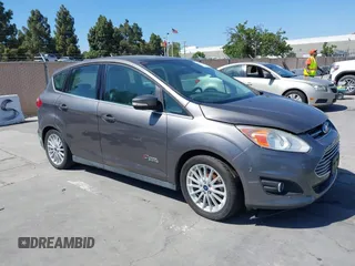 2013 Ford C-Max SEL z VIN 1FADP5CU3DL556211, wystawiony jako IAAI lot #42413793 z przebiegiem Nie podano mil oraz . Historia ofert i sprzedaży dostępna na DreamBid. Obrazek 1.
