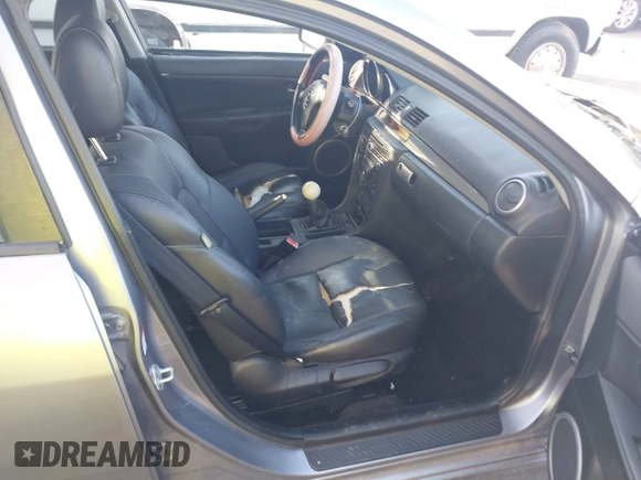 2005 Mazda 3 s with VIN JM1BK323351252581, listed as a IAAI auction lot 42012813 with 173,763 mi miles. Bid and sale history available at carsss.com. Image 5.