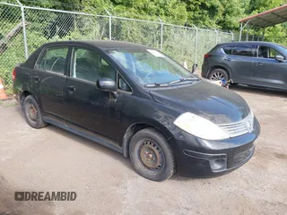 2009 Nissan Versa 1.8 S with VIN 3N1BC11E39L497791, listed as a IAAI auction lot 39679827 with 113,244 mi miles. Bid and sale history available at carsss.com. Image 1.