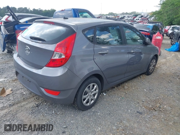 2014 Hyundai Accent GS with VIN KMHCT5AE3EU141605, listed as a IAAI auction lot 42157550 with 174,197 mi miles. Bid and sale history available at carsss.com. Image 4.