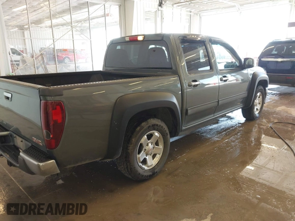 2011 GMC Canyon SLT with VIN 1GTD5NFE4B8106202, listed as a IAAI auction lot 41770524 with 193,200 mi miles. Bid and sale history available at carsss.com. Image 4.