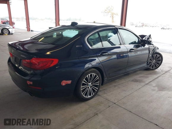 2019 BMW 5 Series 530e with VIN WBAJA9C50KB254535, listed as a IAAI auction lot 41094049 with 57,874 mi miles and . Bid and sale history available at DreamBid. Image 4.