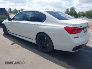 2017 BMW 7 Series 750i with VIN WBA7F0C32HGM22273, listed as a IAAI auction lot 41857151 with 90,518 mi miles and . Bid and sale history available at carsss.com. Image 3.