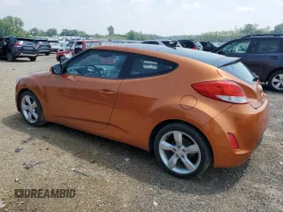 2014 Hyundai Veloster with VIN KMHTC6AD2EU215805, listed as a Copart auction lot 57909825 with 113,004 mi miles and Clean title. Bid and sale history available at DreamBid. Image 2.