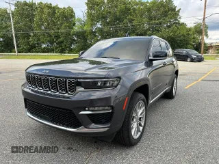 2023 Jeep Grand Cherokee Summit with VIN 1C4RJHEG2P8882566, listed as a Copart auction lot 65095905 with 59,970 mi miles and Salvage title. Bid and sale history available at DreamBid. Image 1.