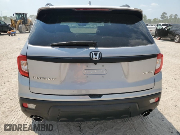 2021 Honda Passport Touring с VIN 5FNYF7H96MB005515, выставлен на аукционе Copart как лот 68536794 с пробегом 30 043 миль миль и Списание • Salvage title. История ставок и продаж доступна на DreamBid. Изображение 6.